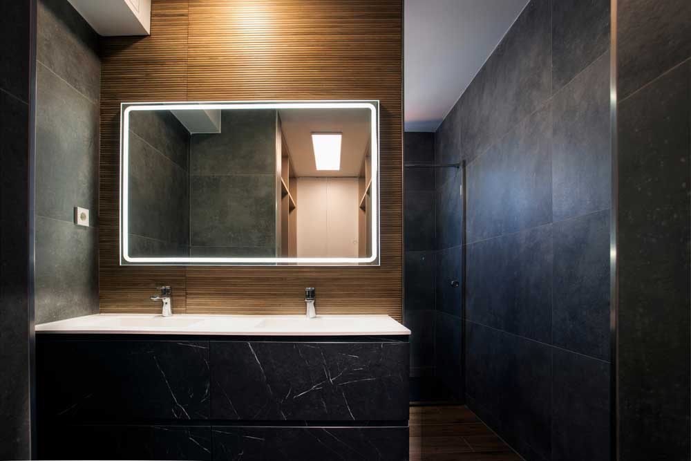 LED vanity lights integrated into a mirror