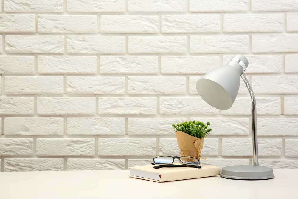 Table lamp with a book