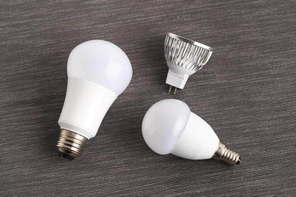 An E26 vs. E14 base light bulb. The E12 base is 2mm slimmer than the E14.