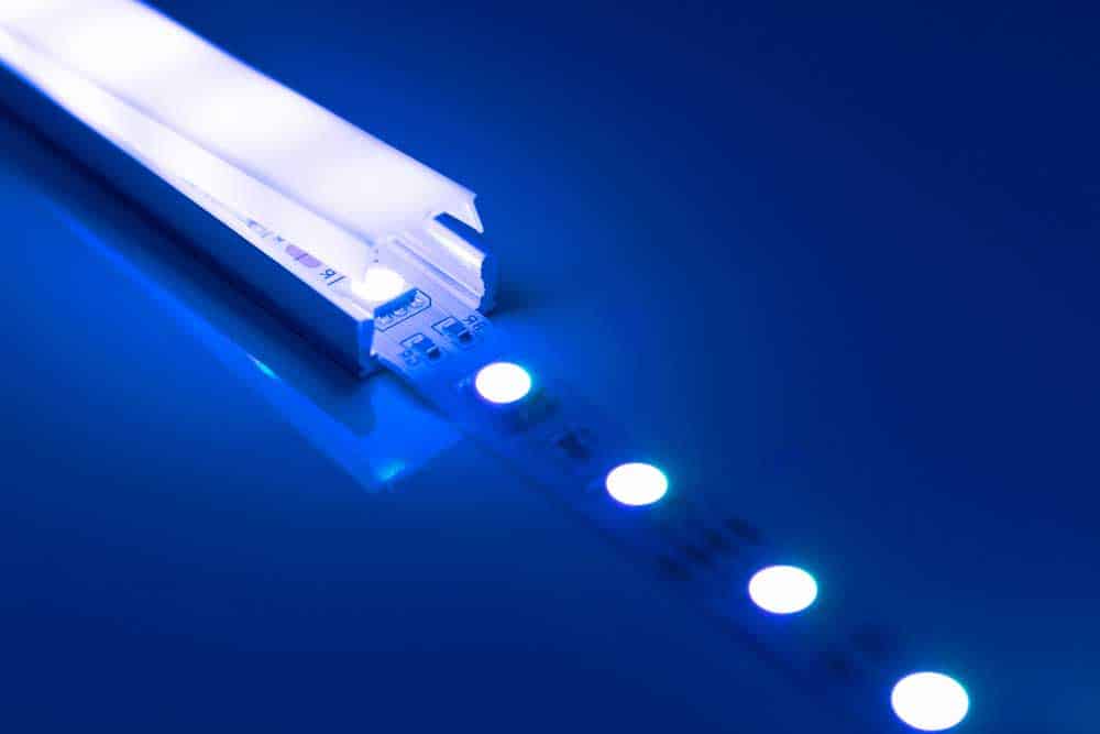 A blue LED strip light in an aluminum channel diffuser