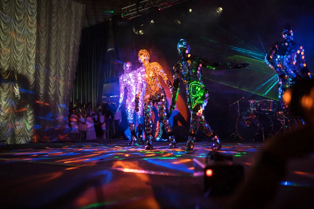 Dancers with LED suites and lasers