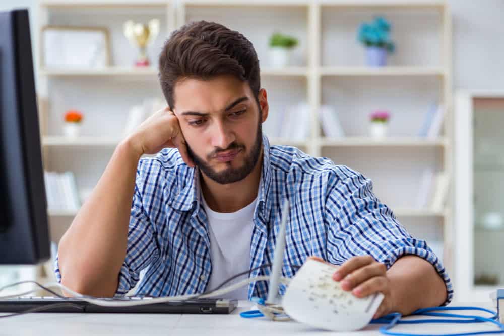 Man having WiFi troubles