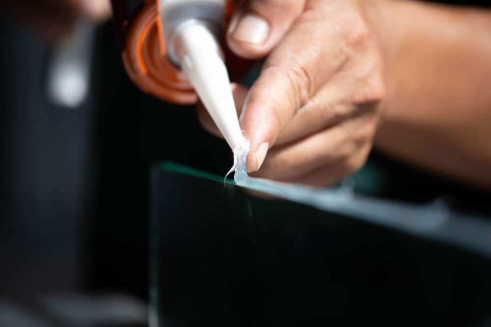 You can apply silicone adhesive to your LED strip.