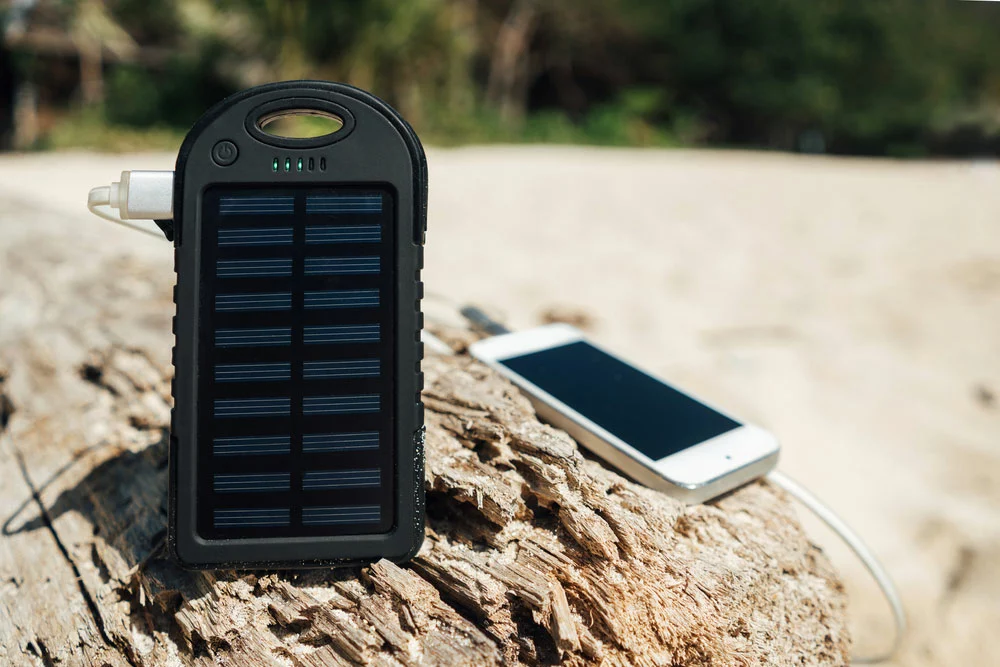 Solar charger powering a phone