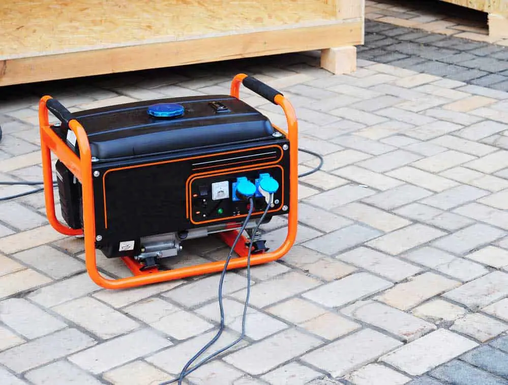 Gasoline portable generator on the house construction site