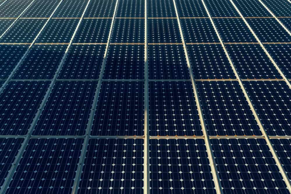 Solar panels surface with shadow over