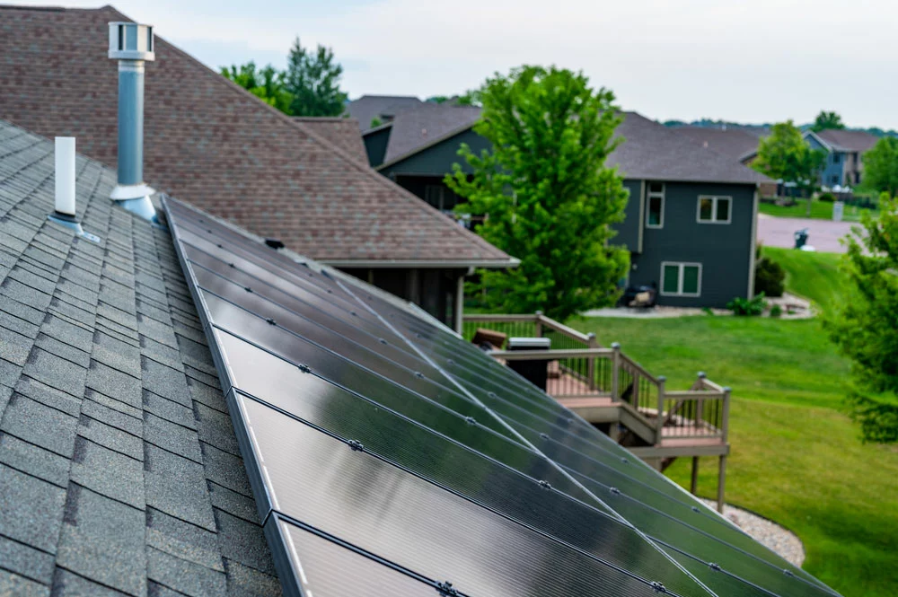 Solar panels installed on asphalt roof