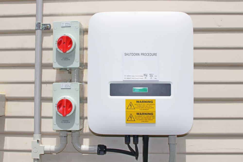 A solar inverter with isolating switches
