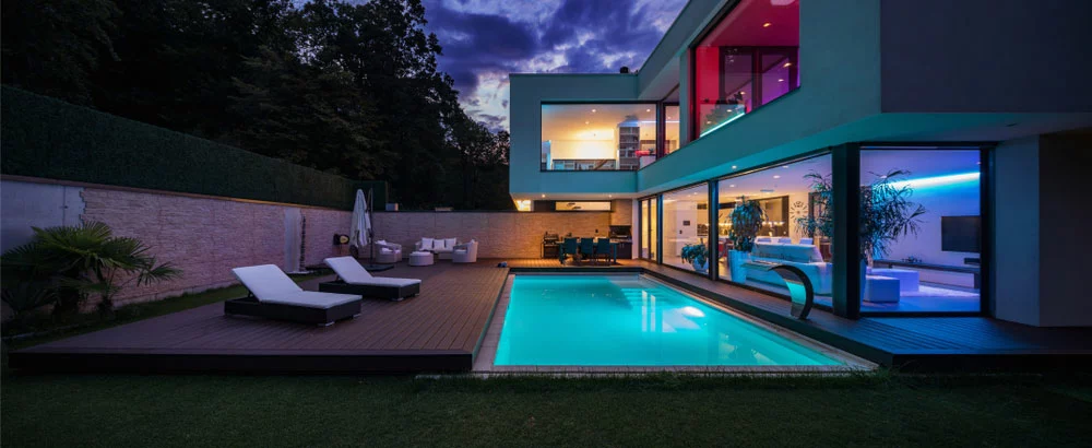Modern villa with LED light during the night.