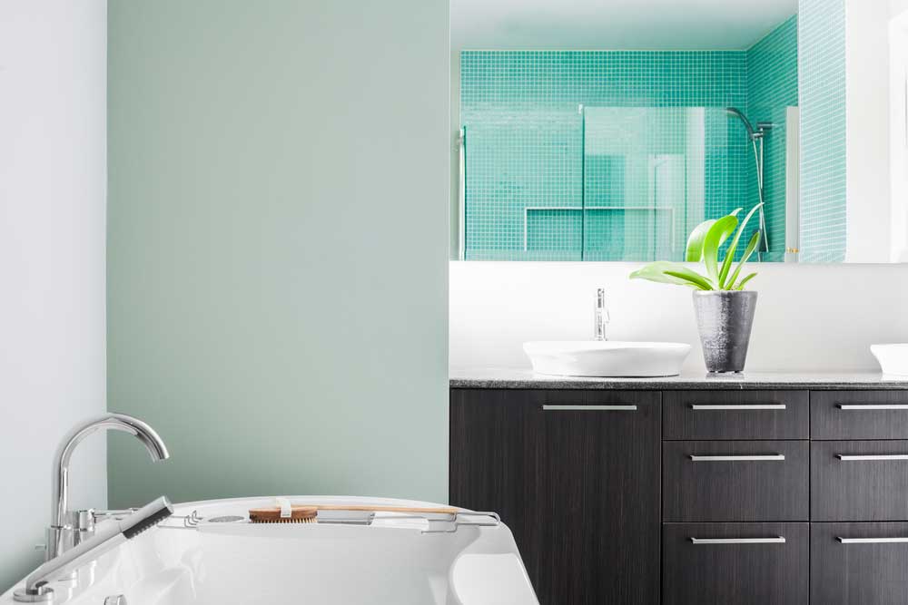 Bathroom Light Temperature: A soft green bathroom wall color
