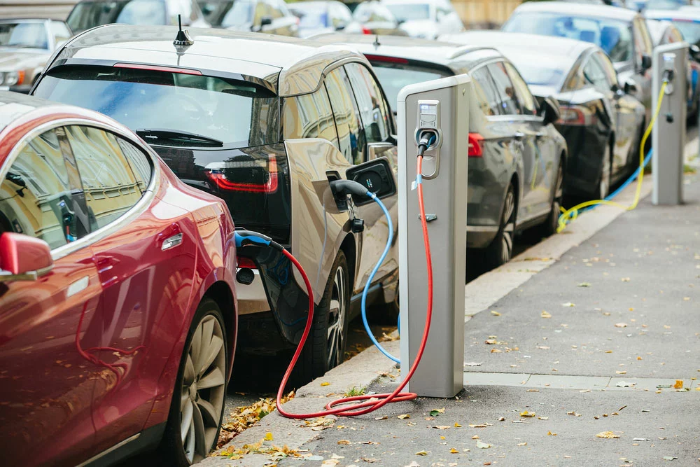 Destination Charger vs. Supercharger:
Two cars charging from one station