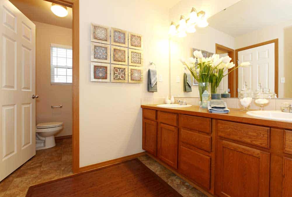 Bathroom Light Temperature: Bright wooden cabinets in the bathroom