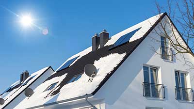 Solar panels on a roof during winter