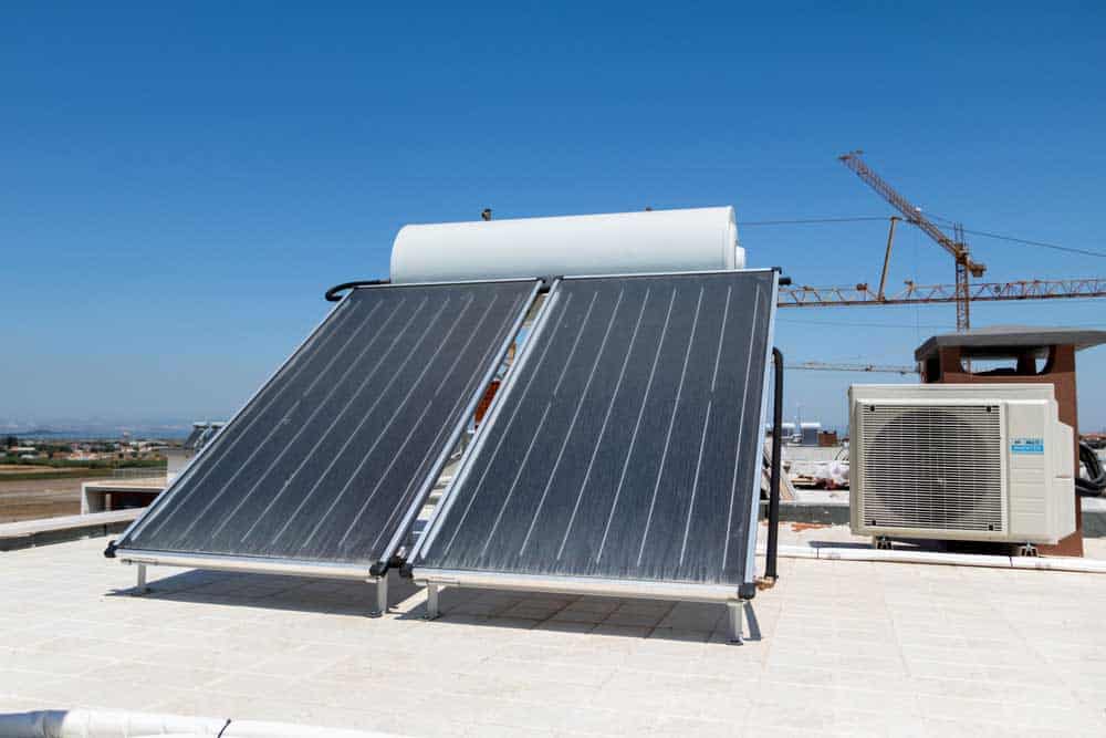 Solar panel on an air conditioner