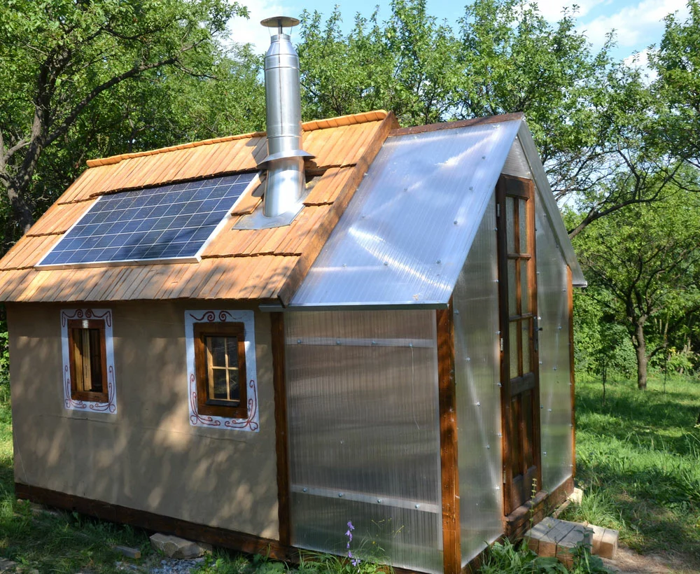 Off-the-grid tiny home with solar panels installed.