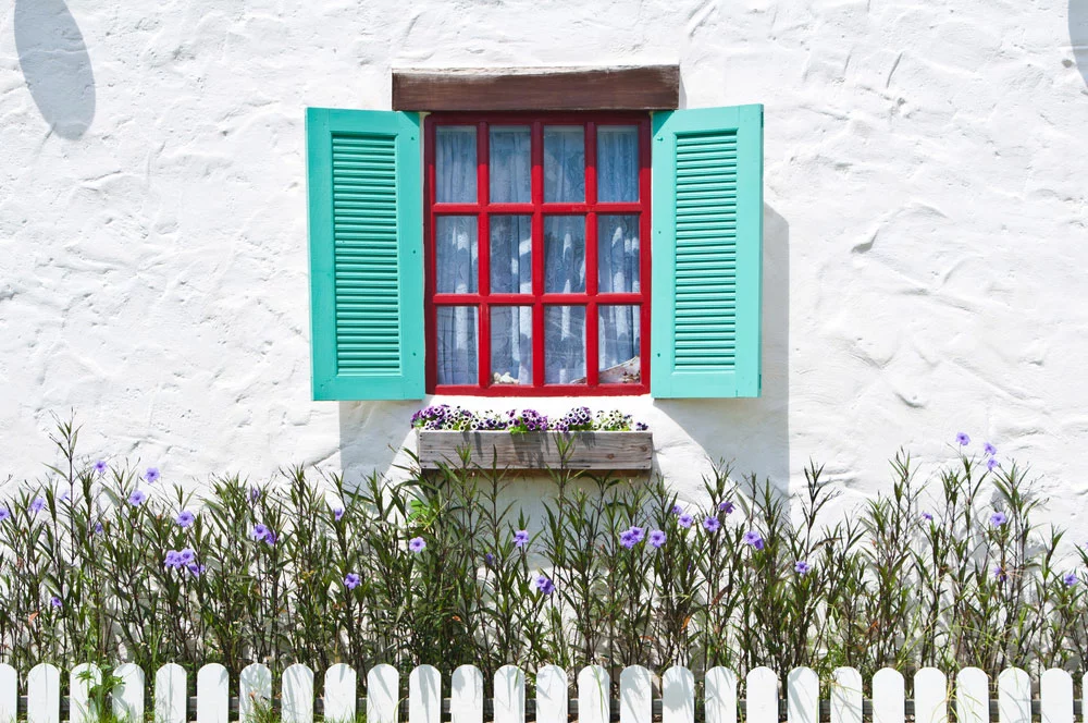 Colorful vintage window on a wall