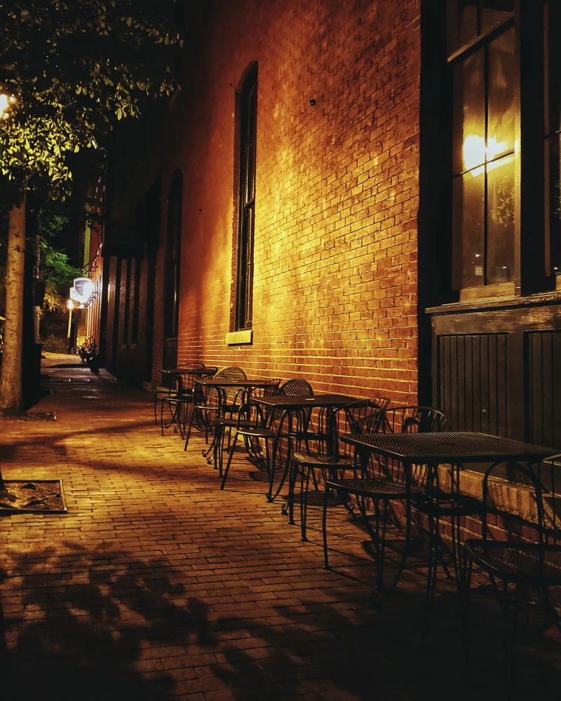 Outdoor seating areas at night