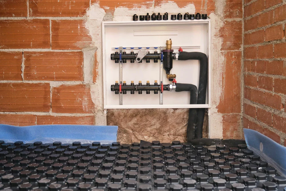 Hydronic floor heating system with the manifold. 