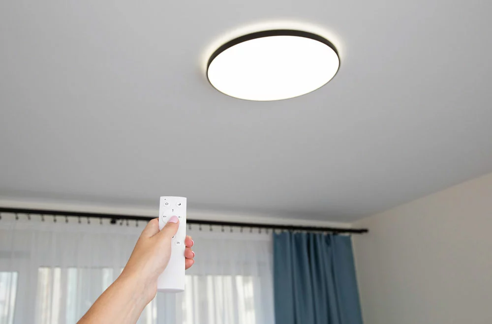 An overhead lamp with a remote control for brightness adjustment