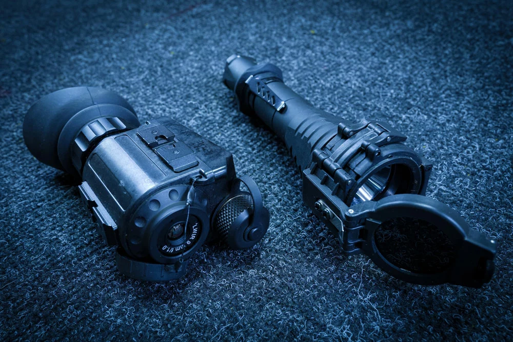 A night vision monocular and an infrared flashlight